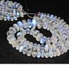 Natural Earth Mined Blue Flash Moonstone AAA Grade Smooth Roundel Beads 7mm to 12mm large size, 14 Inches Strand The moonstone is characterised by an enchanting play of light. Indeed it owes its name to that mysterious shimmer which always looks different when the stone is moved and is known in the trade as adularescence. 